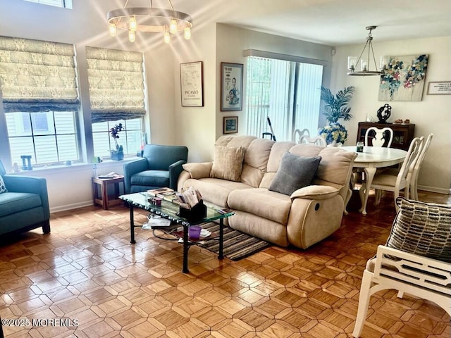 13 Sedgwick Sq, Jackson, NJ 08527 - living area featuring a chandelier and baseboards