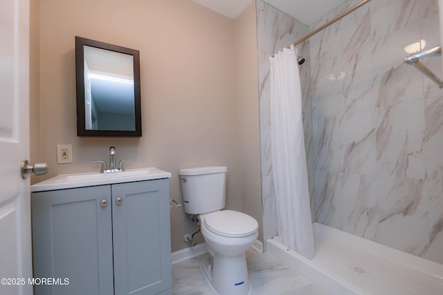 bathroom featuring walk in shower, vanity, and toilet