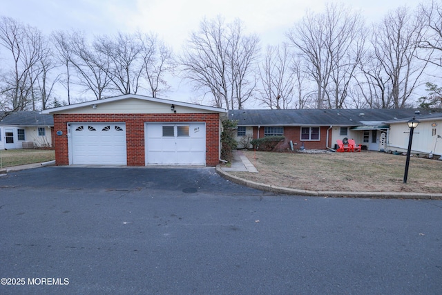 single story home featuring a garage