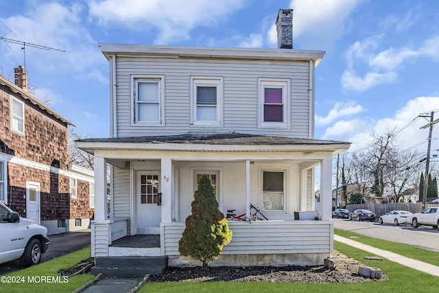 view of front of home featuring covered porch