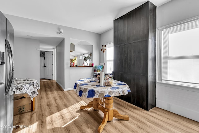 dining space featuring light hardwood / wood-style floors