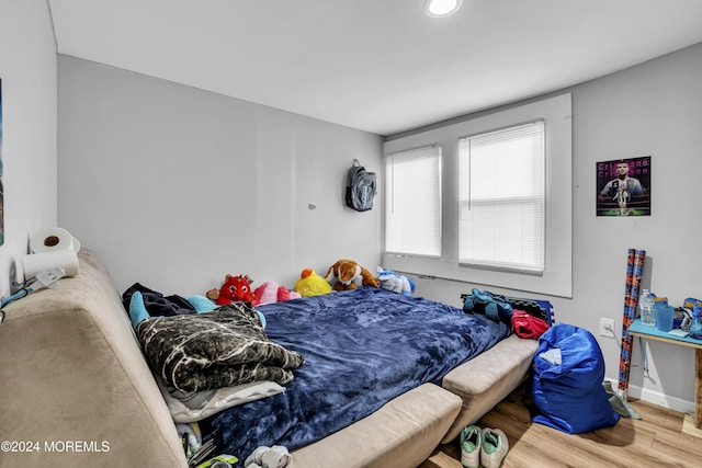 bedroom featuring wood-type flooring