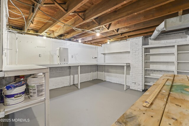 basement with a workshop area