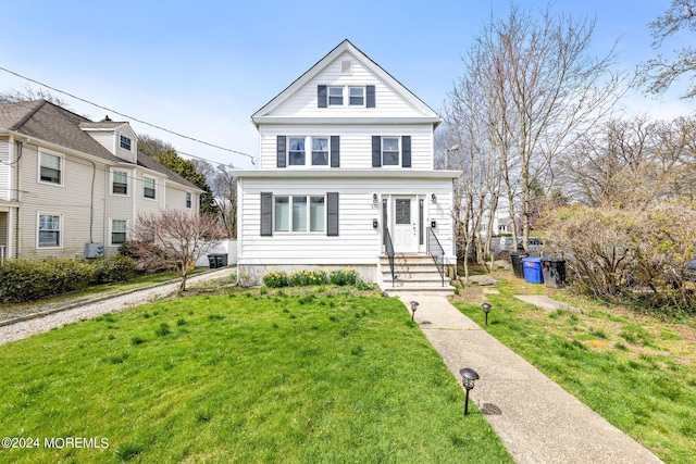 view of front facade featuring a front yard