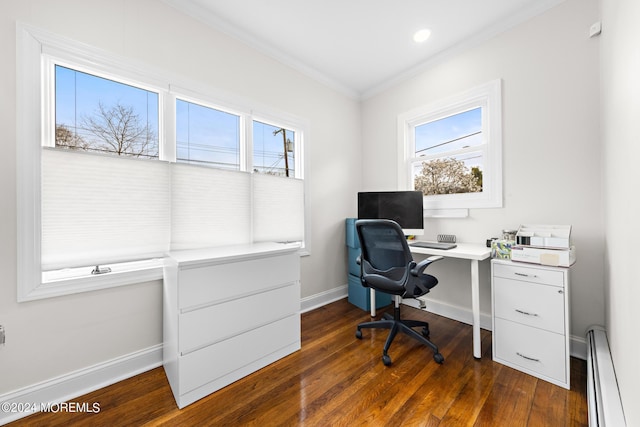 office space featuring dark hardwood / wood-style flooring, crown molding, and baseboard heating