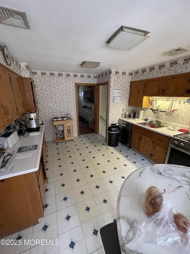 kitchen featuring stainless steel appliances and sink