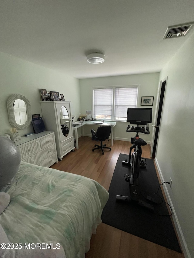 bedroom featuring light hardwood / wood-style flooring