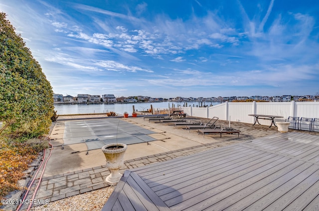 deck featuring a water view