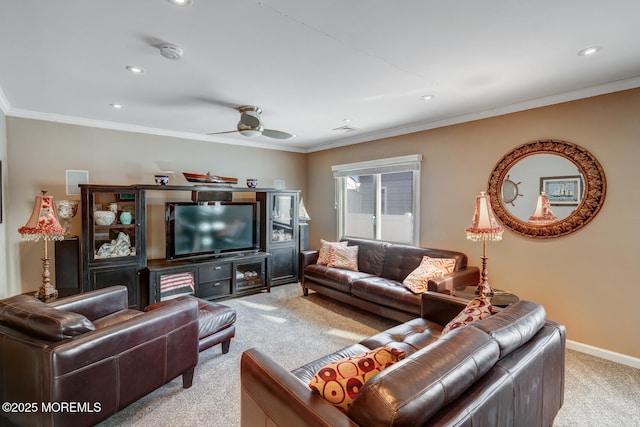 carpeted living room featuring crown molding and ceiling fan