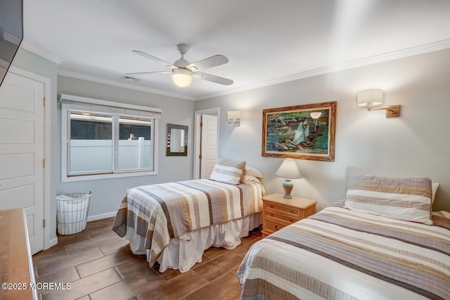 bedroom featuring ornamental molding and ceiling fan