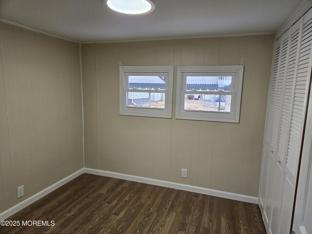 2300 Massachusetts Ave Unit 42, Toms River, NJ 08755 - unfurnished room with dark wood-type flooring and ornamental molding