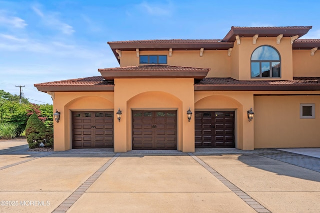 1548 N Bay Ave, Toms River, NJ 08753 - view of front facade featuring driveway, stucco siding, and a tile roof