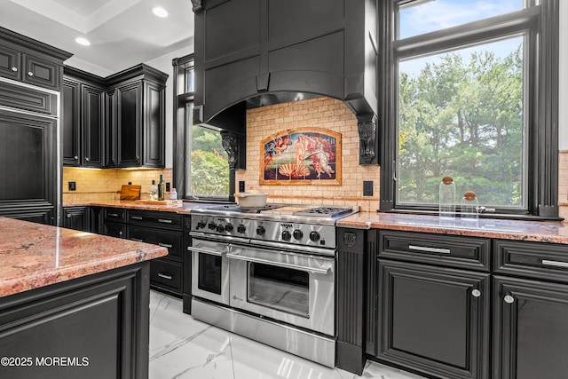 1548 N Bay Ave, Toms River, NJ 08753 - kitchen featuring range with two ovens, dark cabinets, light marble finish flooring, and recessed lighting