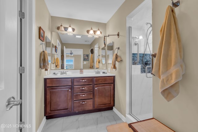 bathroom featuring vanity and a shower with shower door