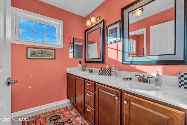 bathroom with vanity and tile patterned flooring