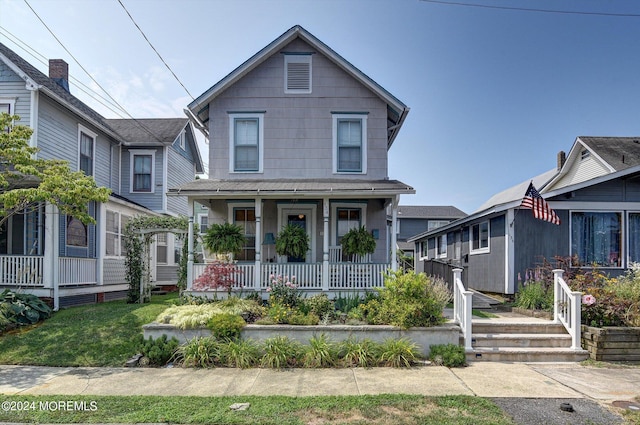 view of front of house with covered porch