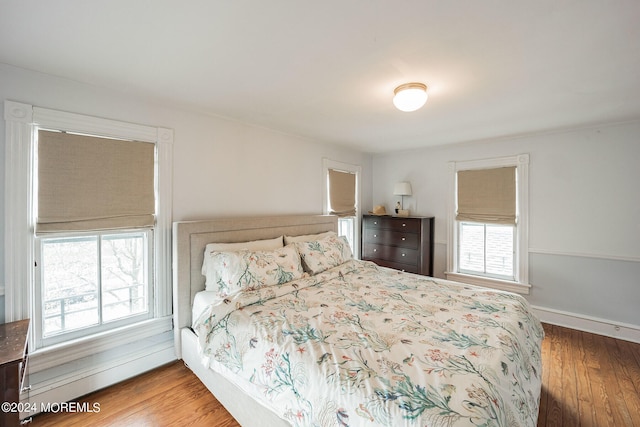 bedroom featuring hardwood / wood-style floors