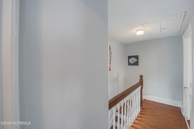 corridor featuring hardwood / wood-style floors