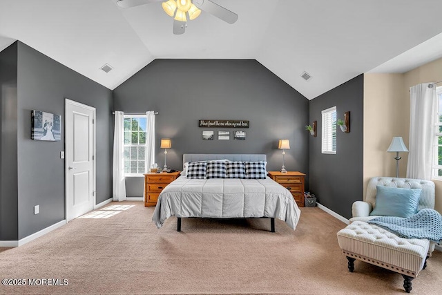 carpeted bedroom with ceiling fan and lofted ceiling