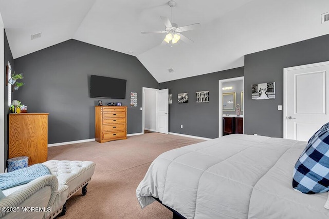 bedroom with lofted ceiling, ensuite bath, carpet floors, and ceiling fan