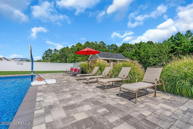 view of patio / terrace featuring a fenced in pool