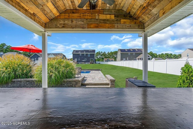 view of patio with ceiling fan