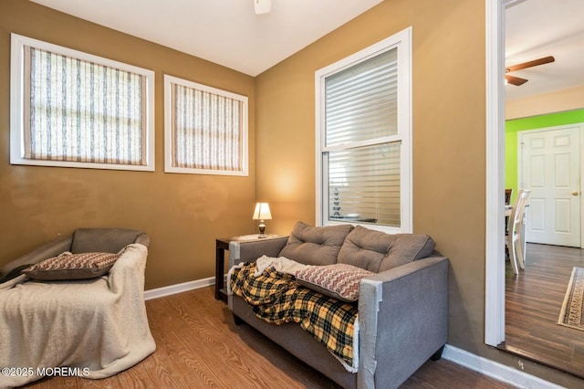 interior space featuring hardwood / wood-style flooring and ceiling fan