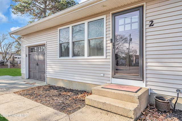 entrance to property with a garage