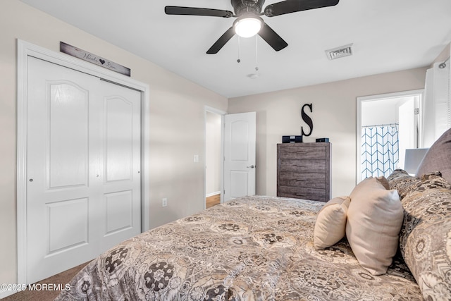 bedroom with ceiling fan and a closet