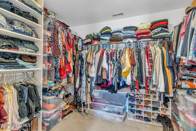 walk in closet with visible vents