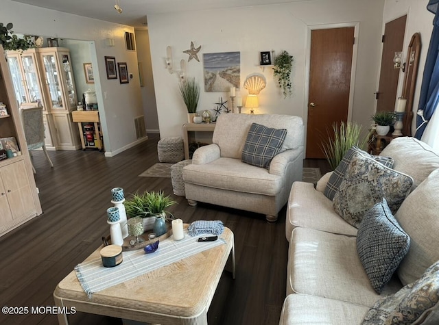 living room featuring dark hardwood / wood-style flooring