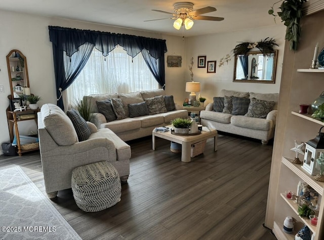 living room with dark hardwood / wood-style floors and ceiling fan