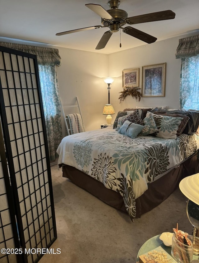 bedroom with carpet floors and ceiling fan