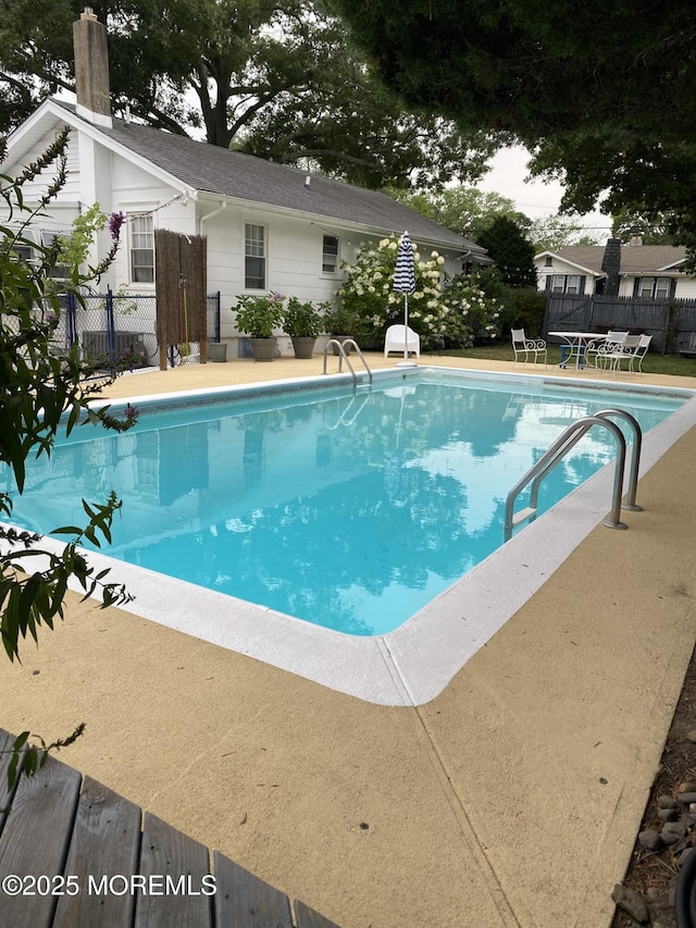 view of pool featuring a trampoline