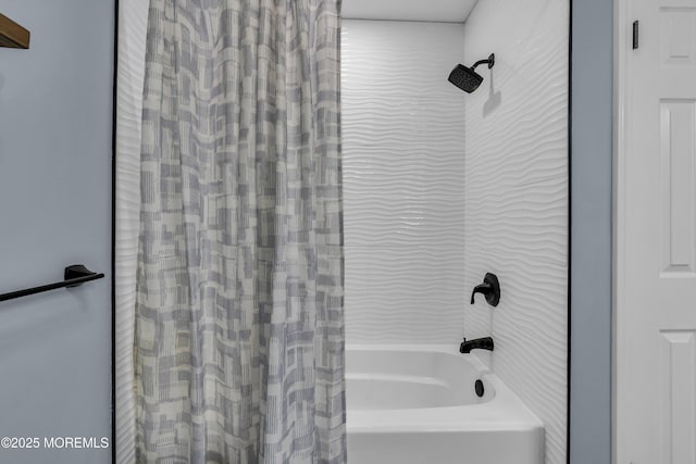 bathroom with shower / tub combo