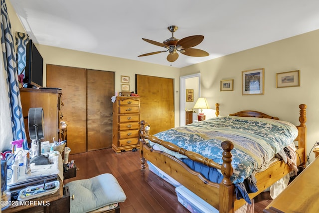 bedroom featuring ceiling fan and dark hardwood / wood-style floors