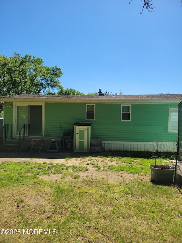 14 Douglas Dr, Jackson, NJ 08527 - rear view of house with a yard