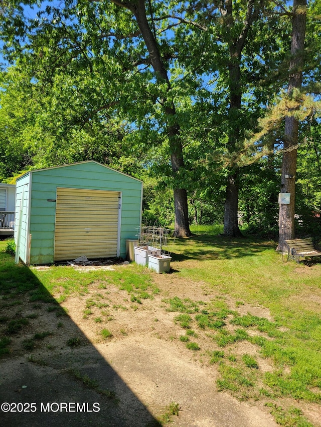 14 Douglas Dr, Jackson, NJ 08527 - view of yard with a garage, an outdoor structure, and driveway