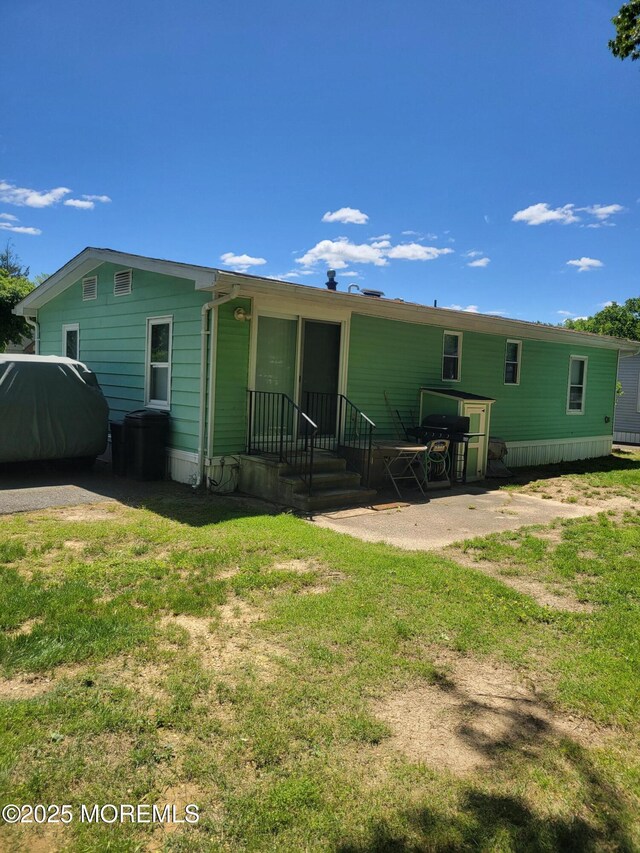 14 Douglas Dr, Jackson, NJ 08527 - back of property with a yard