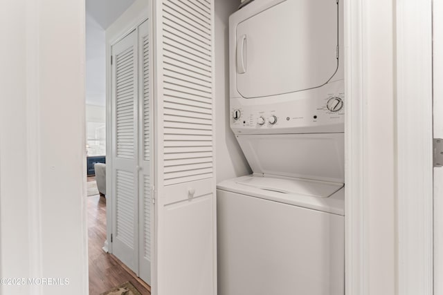 14 Douglas Dr, Jackson, NJ 08527 - laundry area with stacked washing machine and dryer and wood finished floors