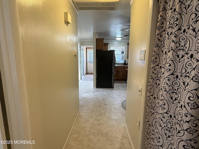 hallway with ornamental molding