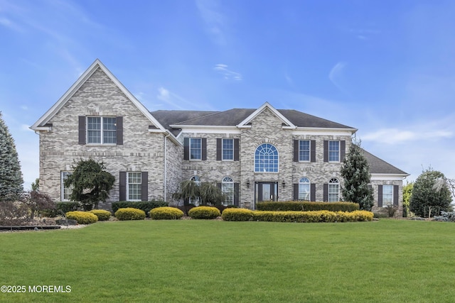 view of front of house with a front lawn