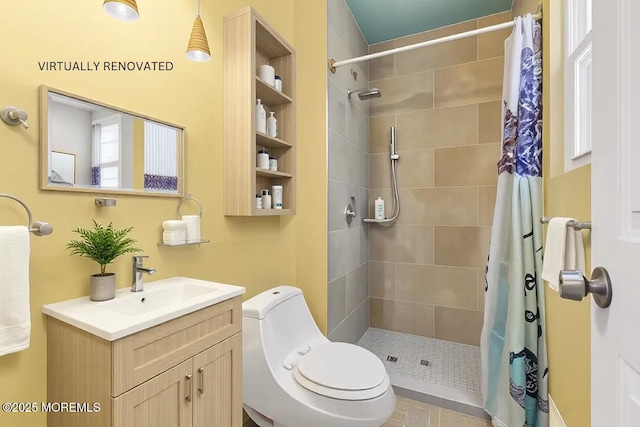 bathroom with a shower with curtain, vanity, and toilet