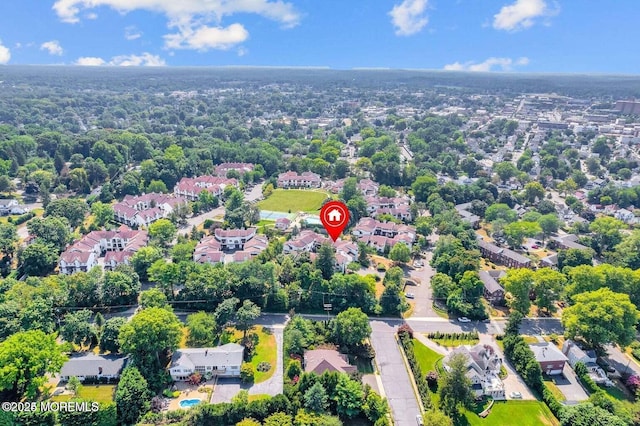 birds eye view of property with a residential view