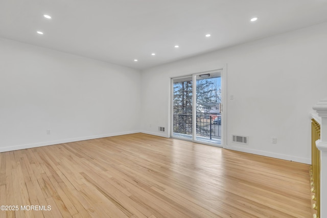 unfurnished living room with baseboards, recessed lighting, visible vents, and light wood-style floors