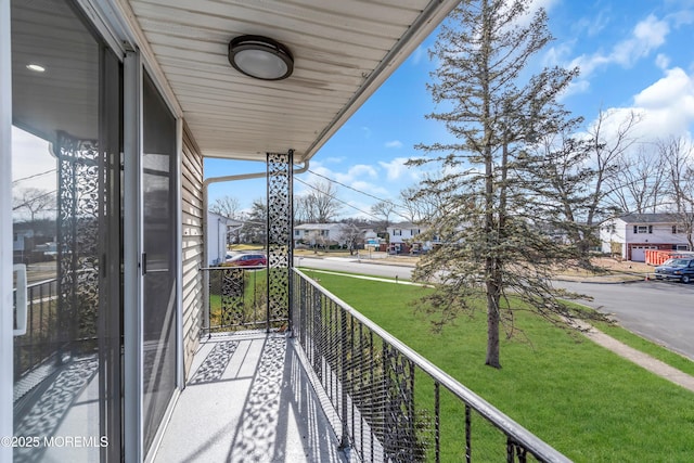 balcony featuring a residential view