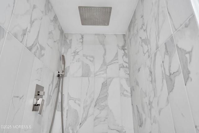 details with a marble finish shower