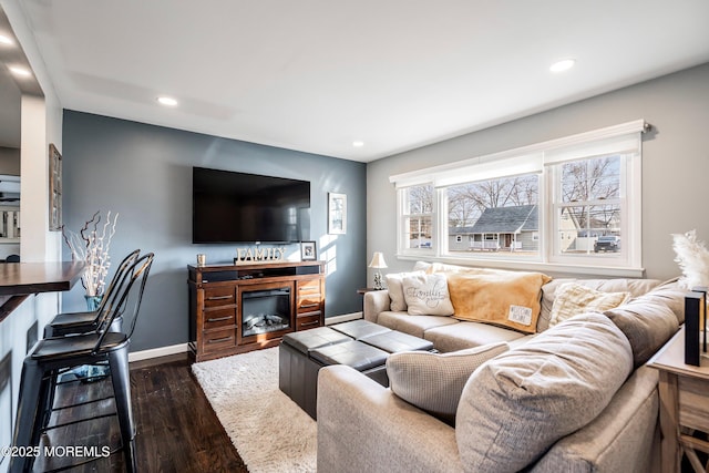 living room featuring dark wood-type flooring