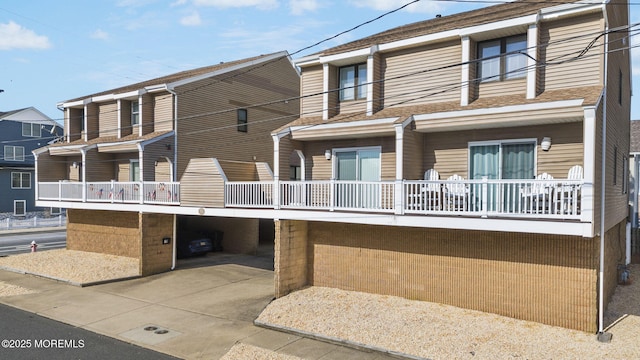 exterior space featuring a balcony