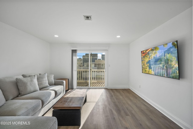 living room with wood-type flooring